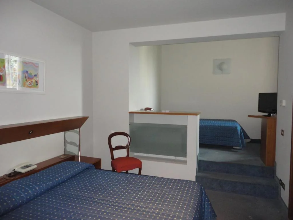 Triple Room with Private Bathroom — Cravero Rooms