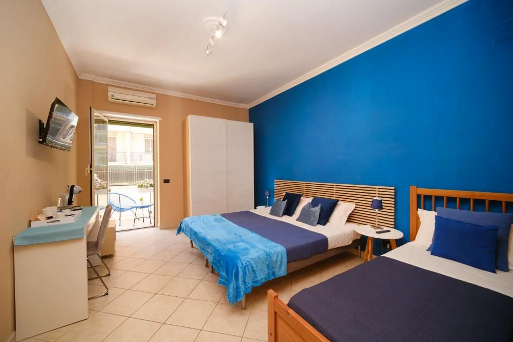Triple Room with External Private Bathroom — Midnight in Vatican
