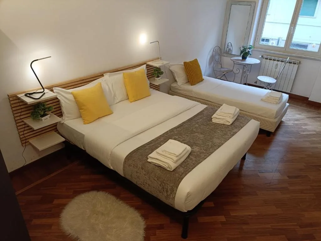 Triple Room with External Private Bathroom — Pop Corn Vatican Suites
