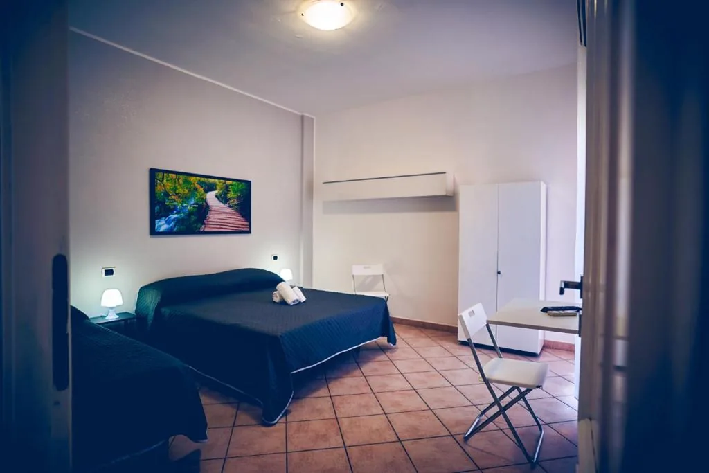 Triple Room with External Private Bathroom — Travelershome 7Metri Ciampino GuestHouse