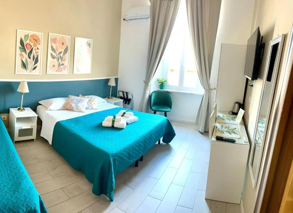 Triple Room with Private Bathroom — Girasole Guesthouse