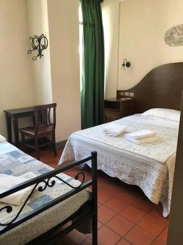 Triple Room with Private Bathroom — Hotel OKAPI