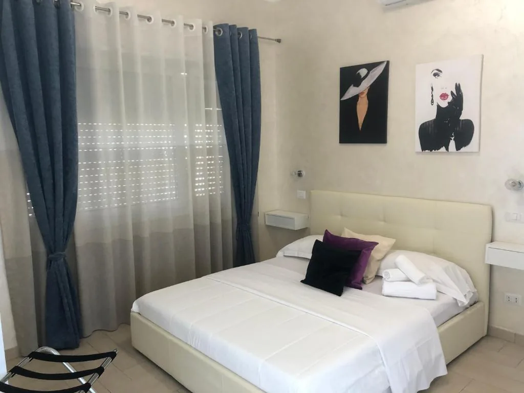 Triple Room with Private Bathroom — Isabel