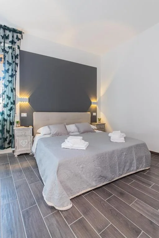 Triple Room with Private Bathroom — Le Camere di Teo