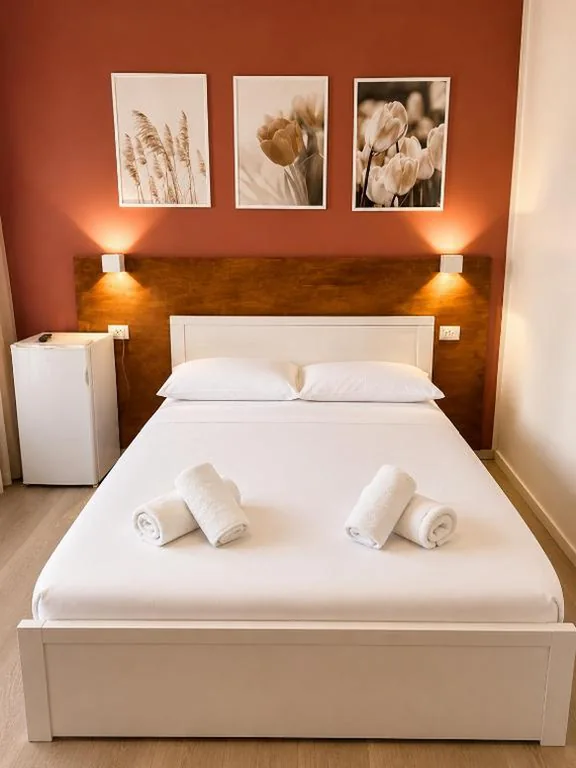 Camera Tripla con Bagno Privato — Novaroma by Local Domus
