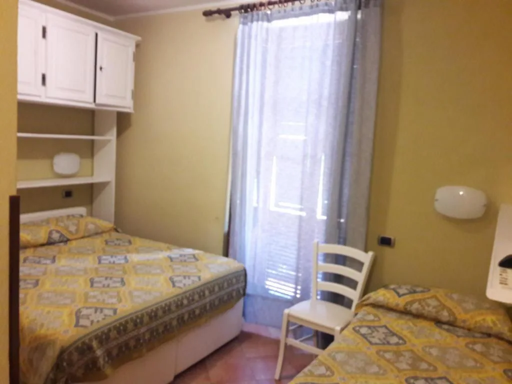 Triple Room with Balcony — affittacamere la loggia