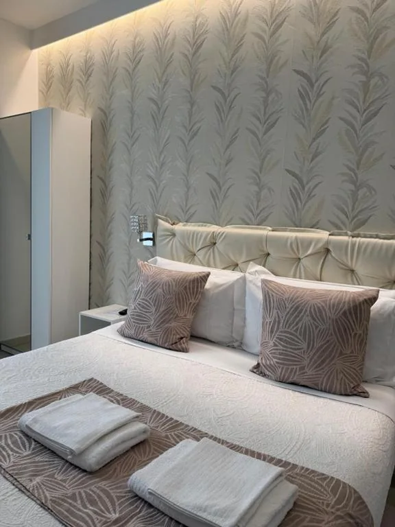 Camera Tripla con Balcone — Alba rooms