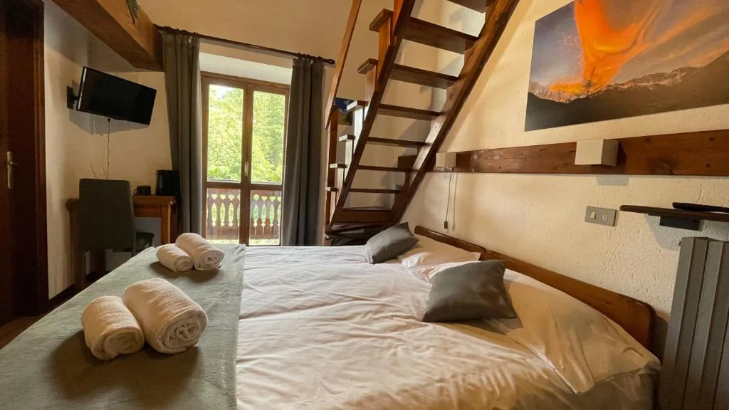 Camera Tripla con Balcone — Chalet Bellevue
