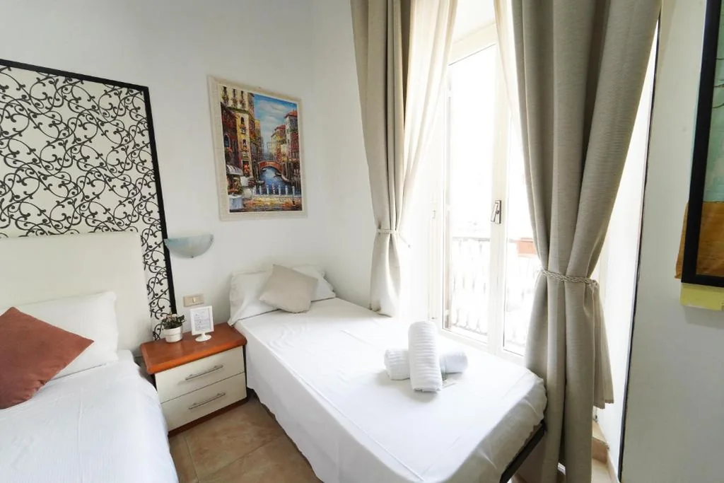 Triple Room with Balcony — Cicero Rome Center