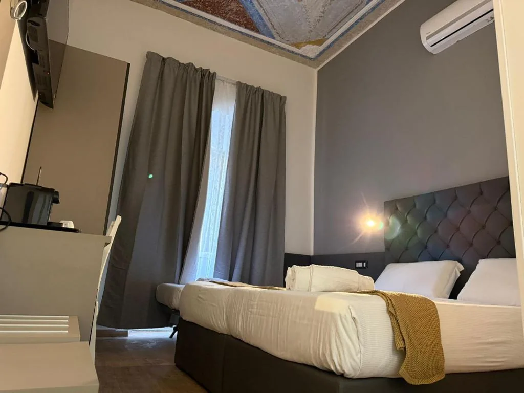 Camera Tripla con Balcone — Conte GuestHouse