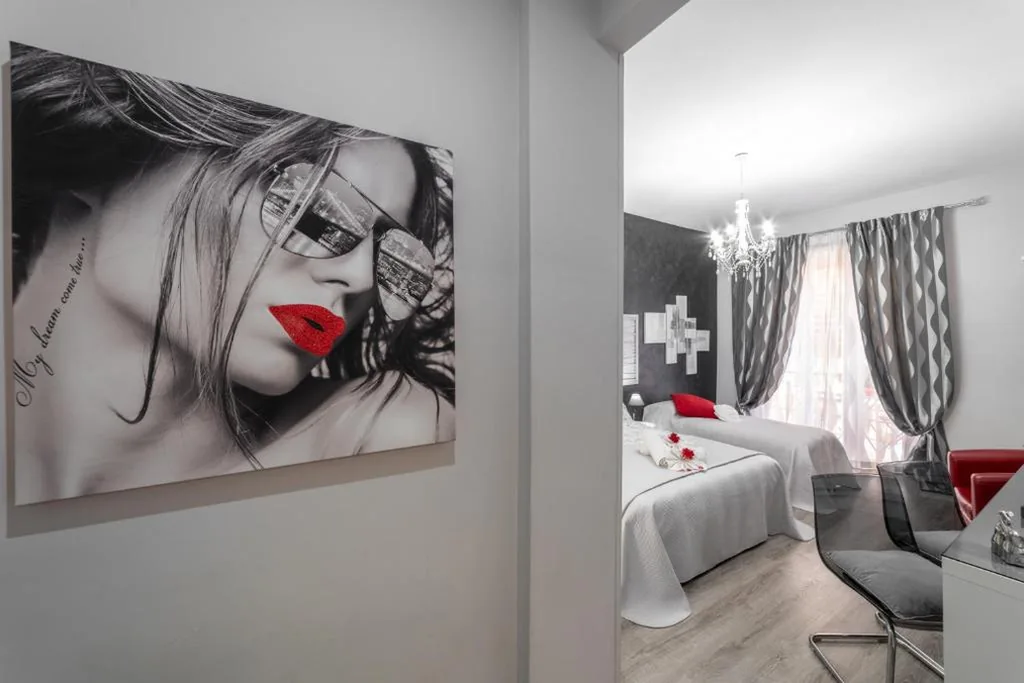 Camera Tripla con Balcone e Bagno Privato — B&B La Maison de Jo
