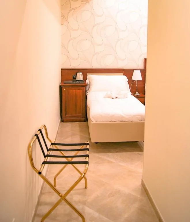 Triple Room with Balcony — Esposizione Boutique