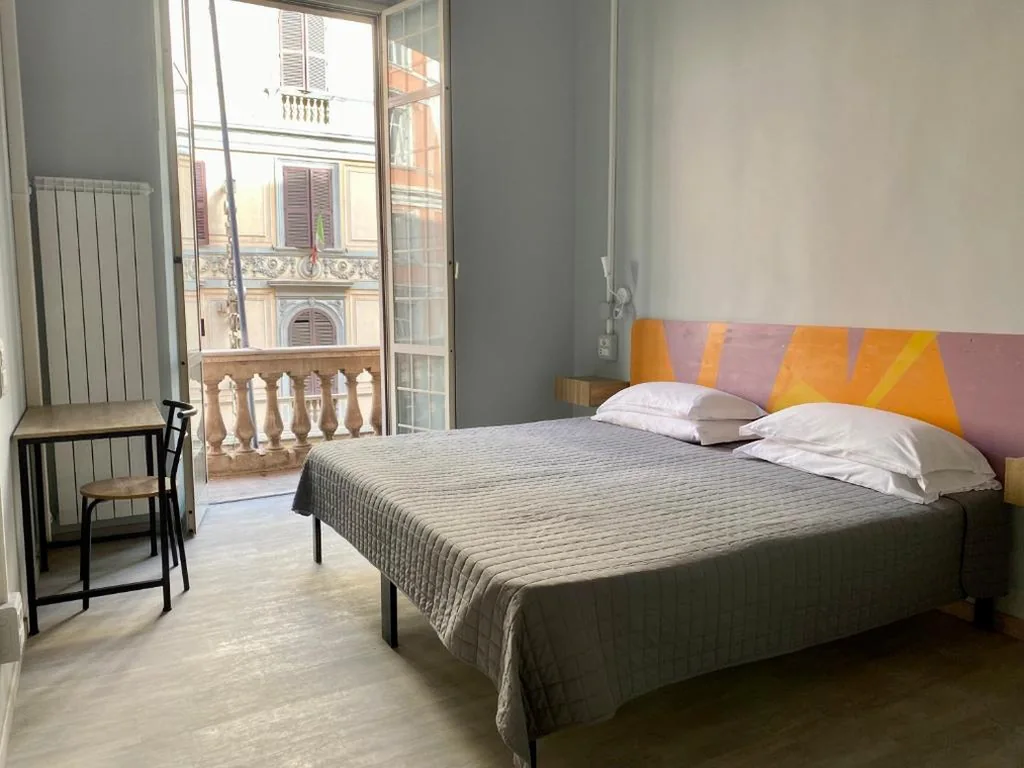 Camera Tripla con Balcone — Eureka Rooms