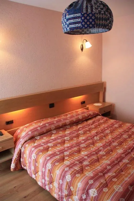 Triple Room with Balcony — Hotel Bellevue