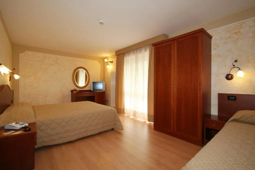 Camera Tripla con Balcone — Hotel Dama Bianca