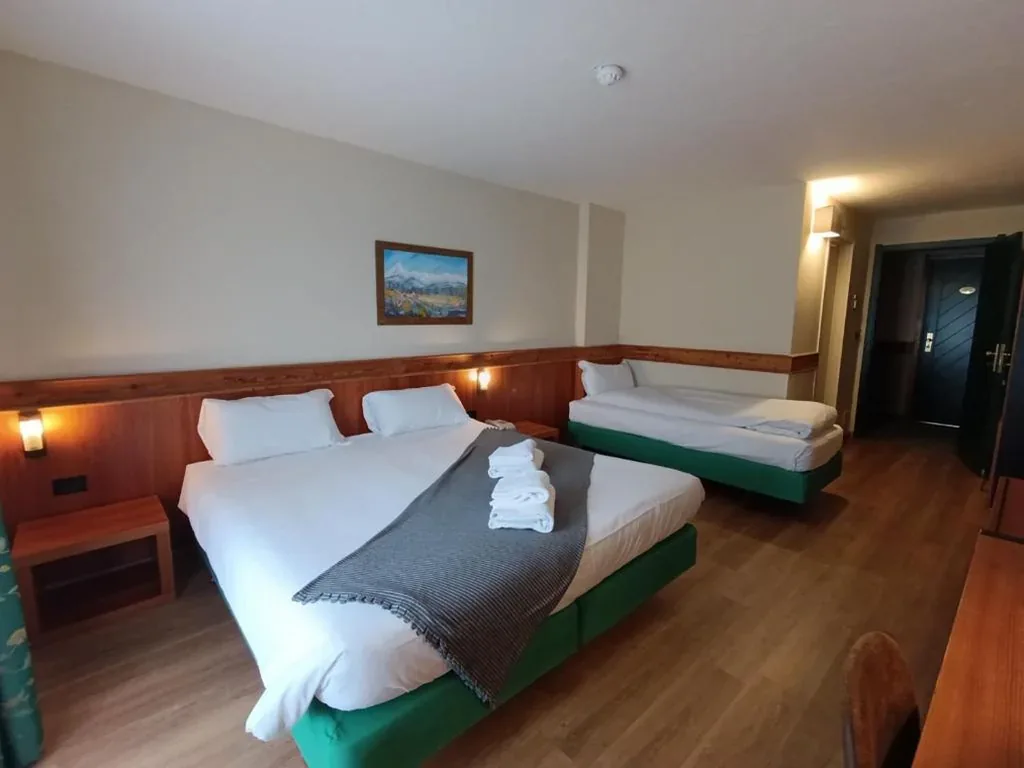 Triple Room with Balcony — Hotel De Champoluc