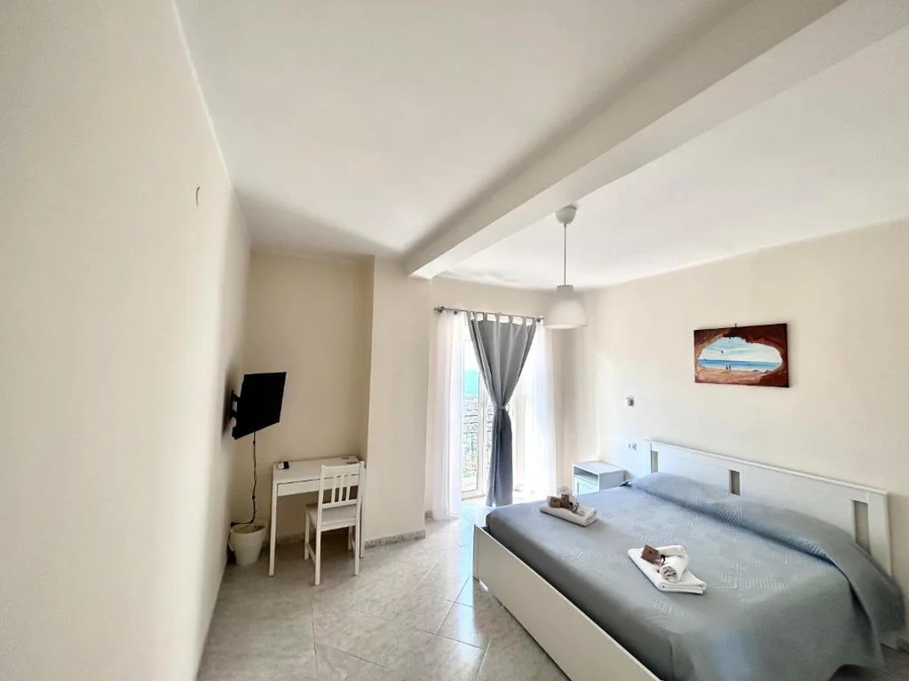 Triple Room with Balcony — Il Nido delle Rondini