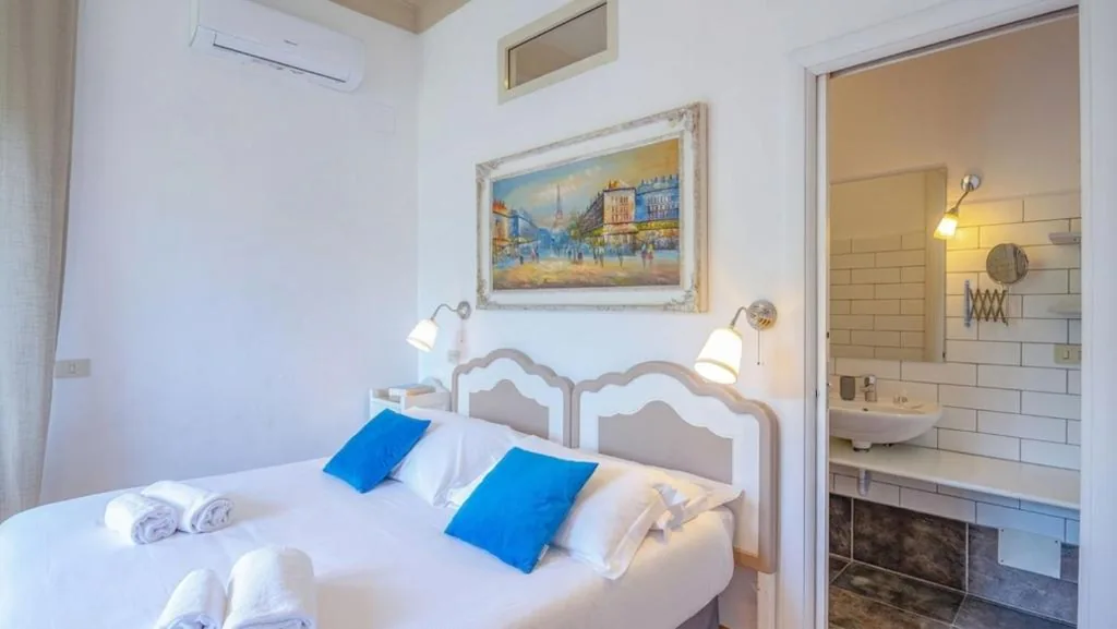 Triple Room with Balcony — Le Suites di Tevere Home
