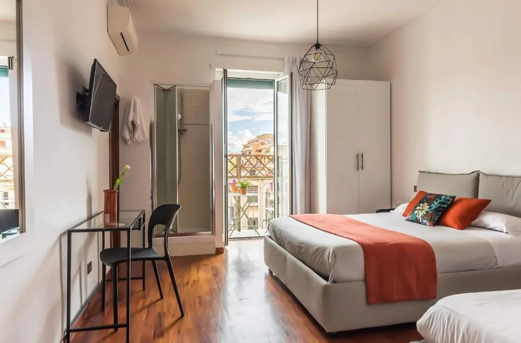 Camera Tripla con Balcone — Prati guest house – Torripagroup