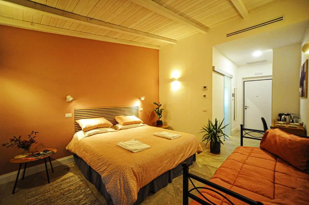 Triple Room with Balcony — Tenuta Bussete Country Hotel