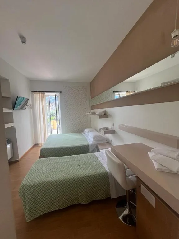 Triple Room with Terrace — Hotel Melograno