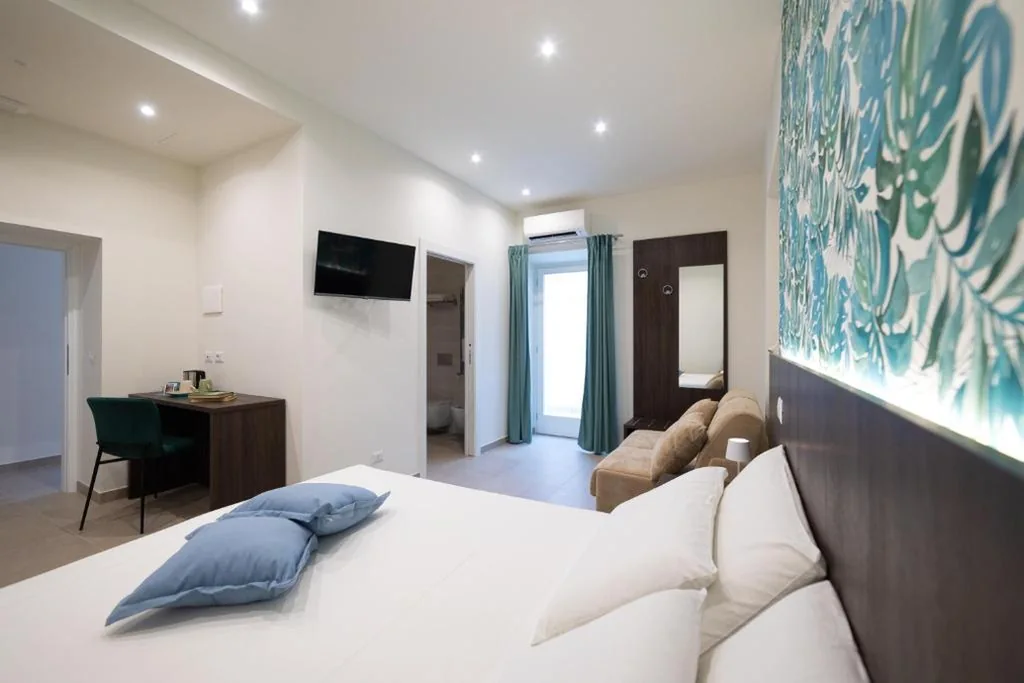 Triple Room with Terrace — NUMISIA Guest House