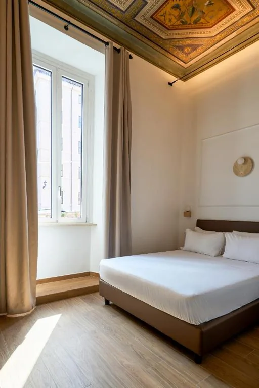 Triple Room with City View — Fantini Rooms- Fori Imperiali