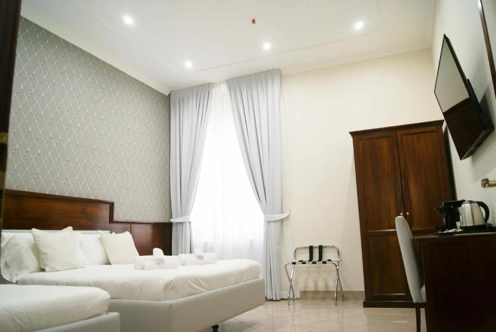 Triple Room with City View — Monti 66 Hotel
