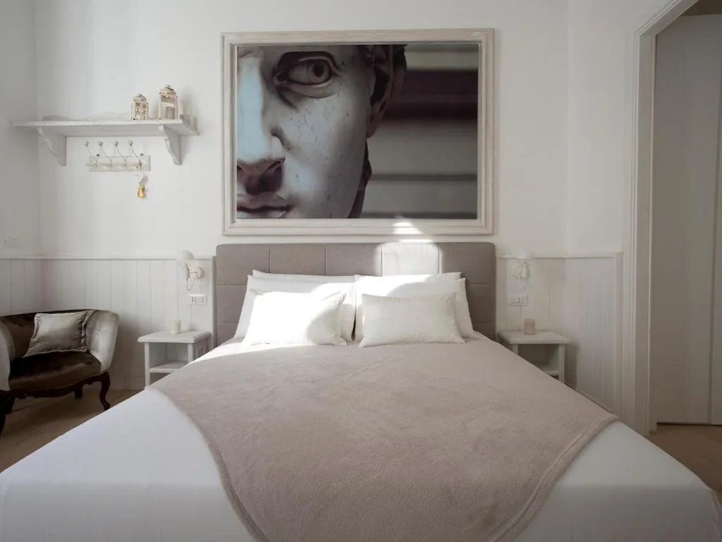 Triple Room with City View — Primo Piano Suites