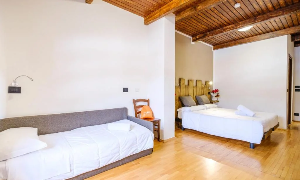 Camera Tripla con Vista Montagna — Chalet Le Alpi – Azzurro Club