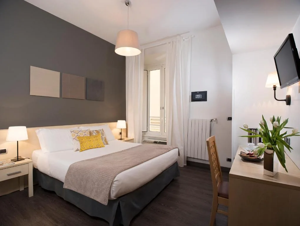 Deluxe Triple Room — 111 ColaDiRienzo Rooms – by AD Roma