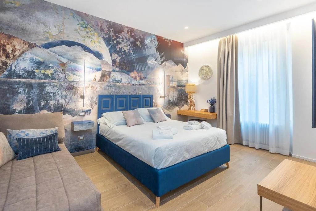 Camera Tripla Deluxe — ARIOSTO’S Luxury Rooms