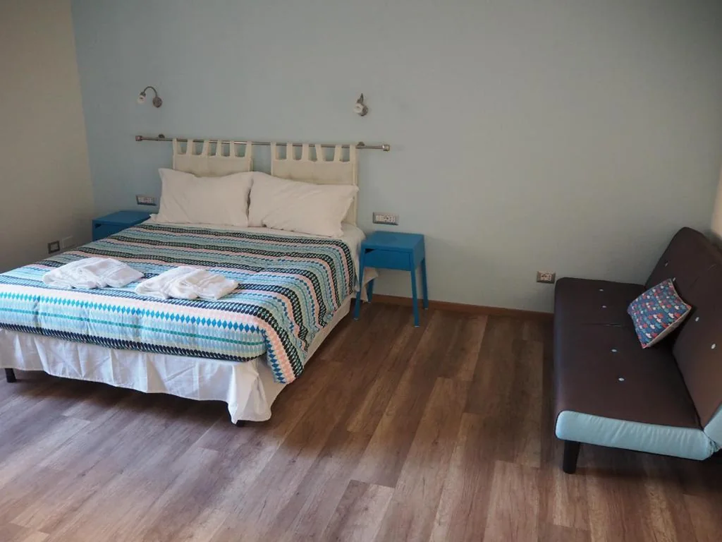 Camera Tripla Deluxe — Bed and Breakfast New Morning Holiday