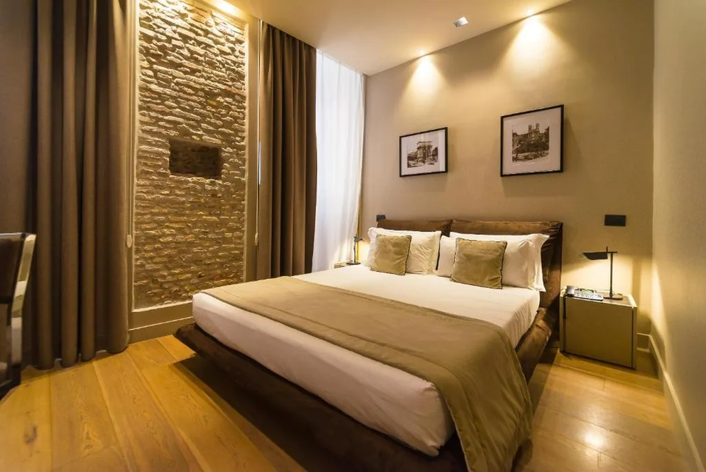 Camera Tripla Deluxe — Campo Marzio Luxury Suites