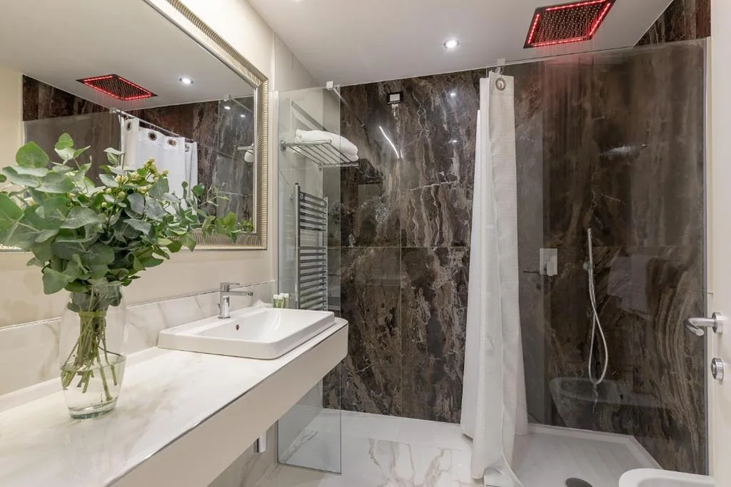 Deluxe Triple Room — Cavour Suites Guest House