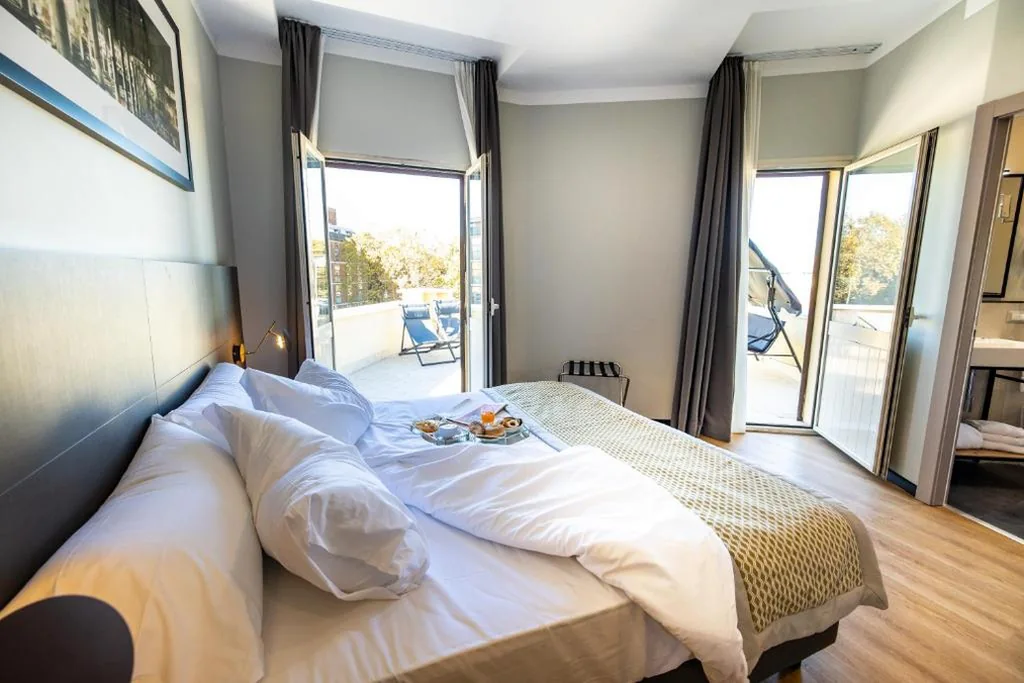 Deluxe Triple Room with Terrace — The Cross Hotel