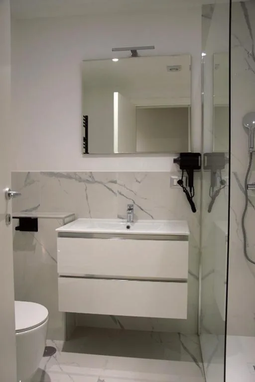 Camera Tripla Deluxe — Domus Dea Roma by Trinità