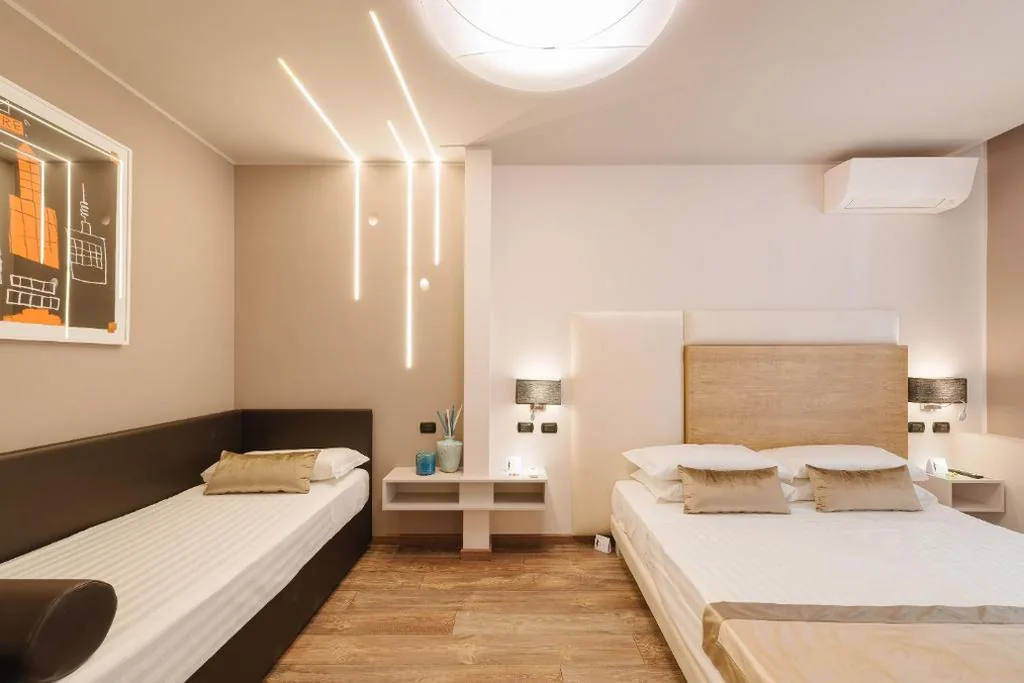 Camera Tripla Deluxe — Etruska luxury Trastevere Guesthouse
