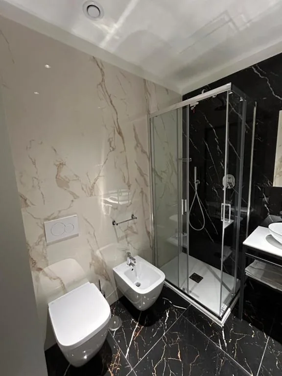 Deluxe Triple Room — Hotel Contilia