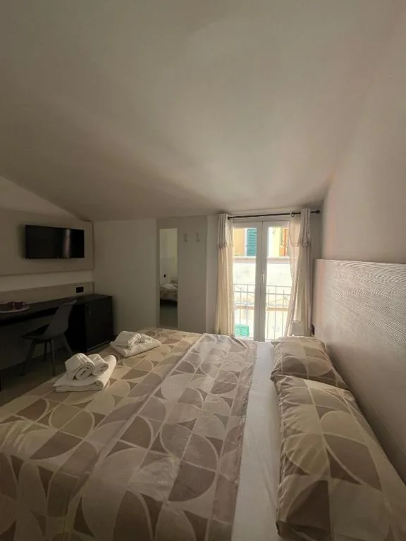 Deluxe Triple Room — Hotel Gandolfo