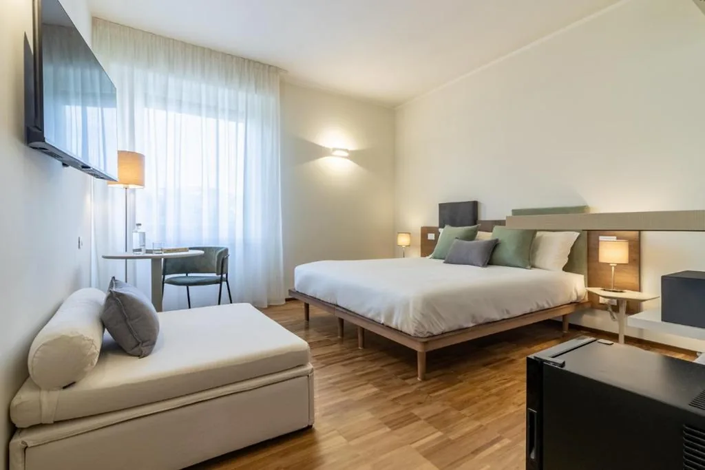 Camera Tripla Deluxe — Il Faro Luxury Rooms & Lounge