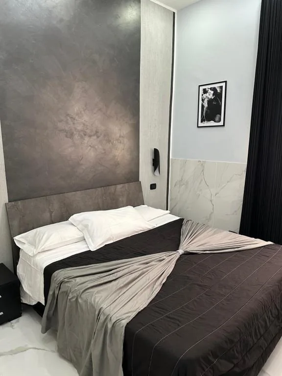 Deluxe Triple Room — Italy Guest House