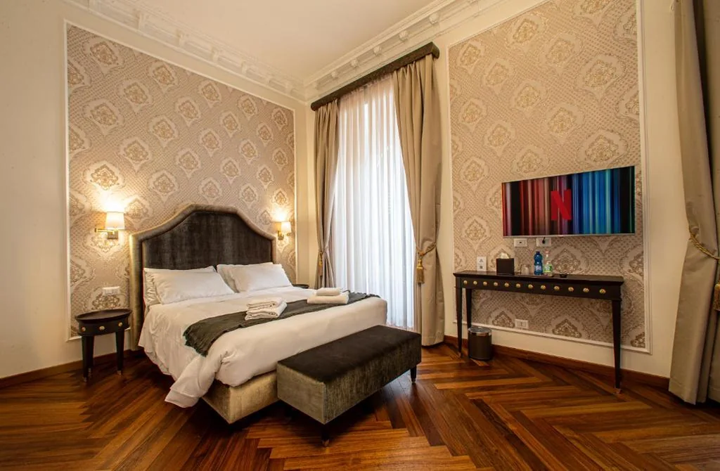 Camera Tripla Deluxe — L’Angolo Sereno Guesthouse Rome Termini