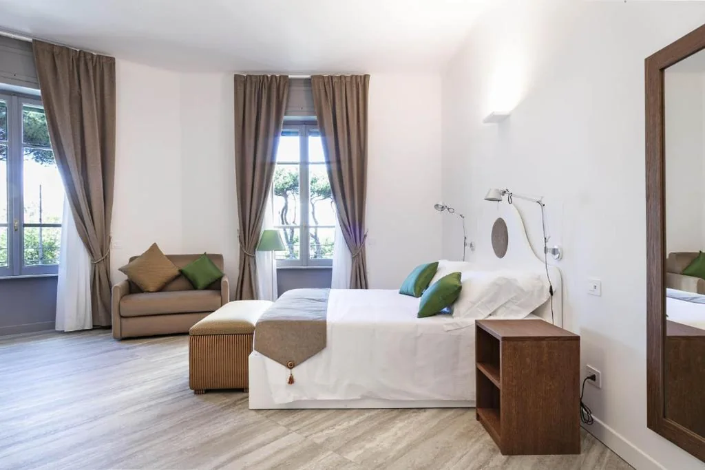 Deluxe Triple Room — Le Navi Rooms
