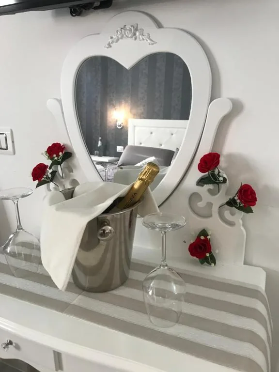 Camera Tripla Deluxe — Le Rose