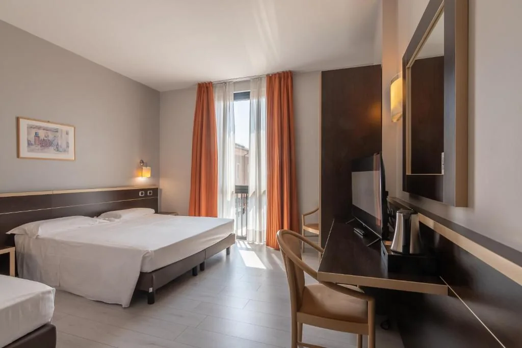 Camera Tripla Deluxe — LVG Hotel Collection – Al Mulino