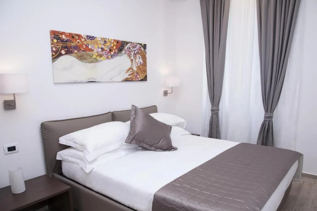 Deluxe Triple Room — Maison Maneli