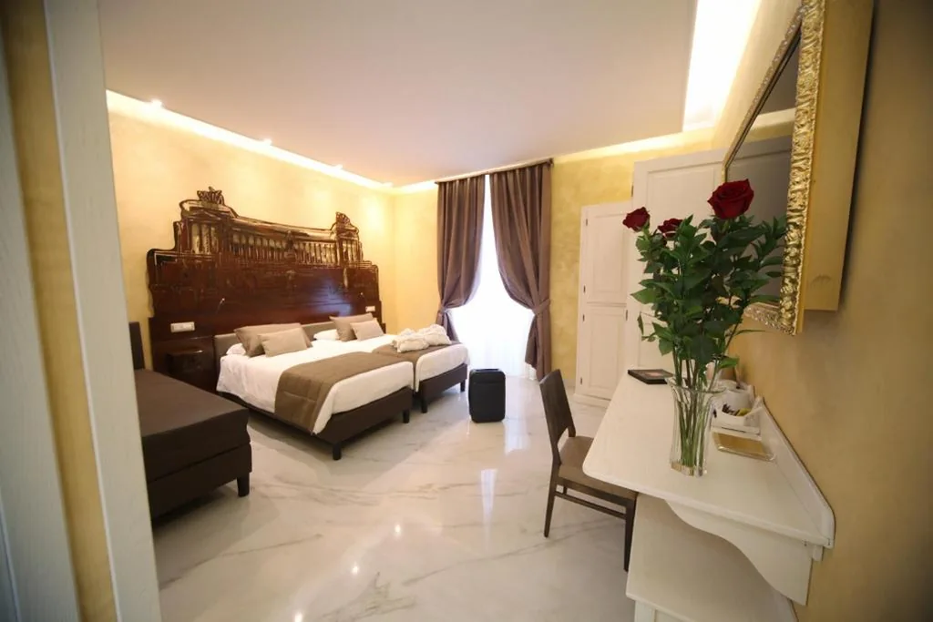 Deluxe Triple Room — Maison Tritone