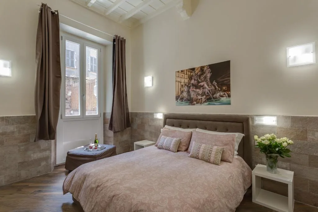 Camera Tripla Deluxe — Navona Charme Suite