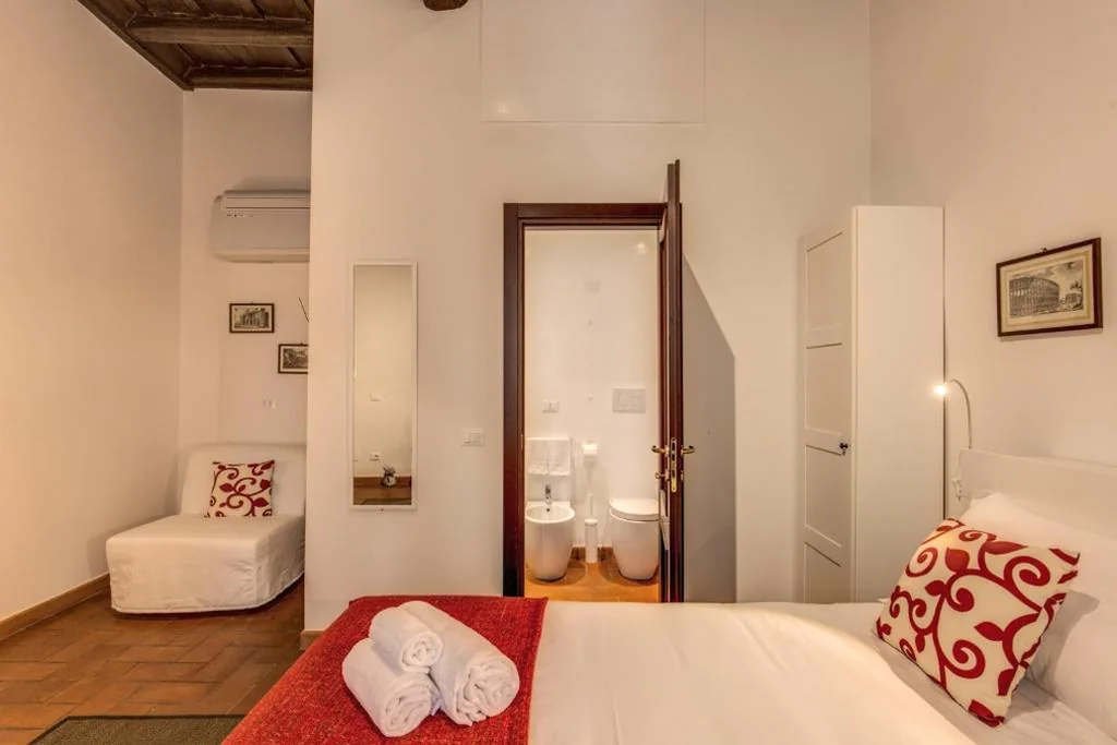 Camera Tripla Deluxe — Piccolo Trevi Suites